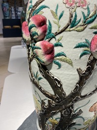 A Chinese famille rose molded 'nine peaches' vase, 19th C.